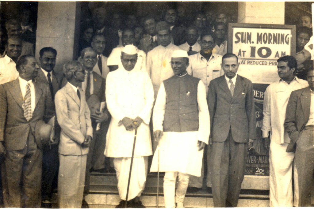 Indian National Games 1950: Moin ul Haq, S.Bhoot, Bombay Chief Minister Kher (center with cane), and Bombay Home Minister Morarji Desai (center)